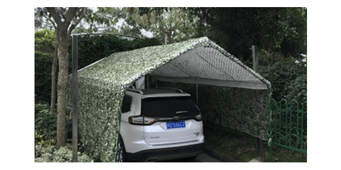 Model garasi mobil terpisah dari rumah sederhana dengan tambahan kanopi   