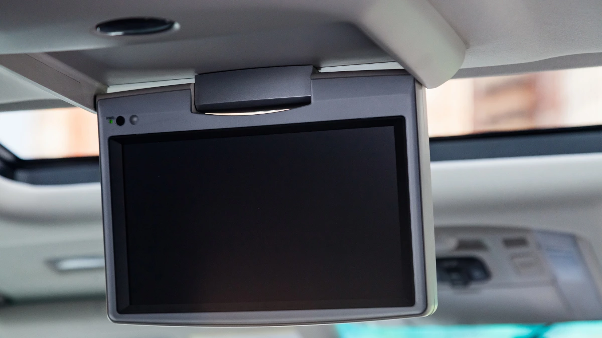 Overhead Screen System Adding Comfort with a Slight Potential for Obstructing the Driver's View